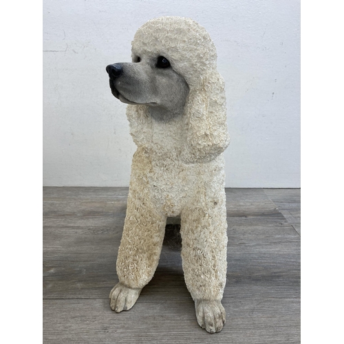 494 - A pair of Leonardo resin poodle figurines - approx. 41cm high