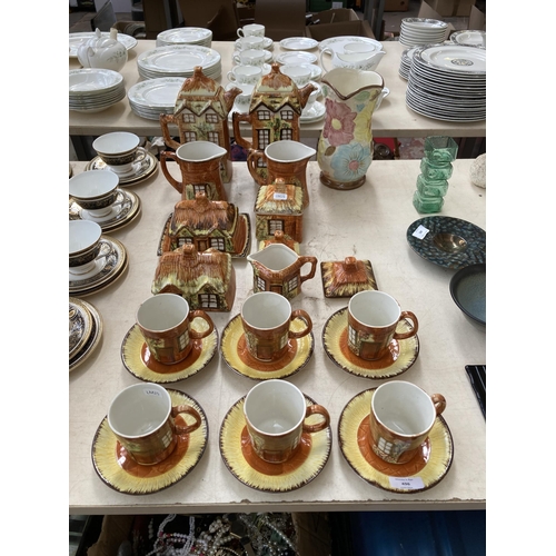 496 - Approx. twenty two pieces of Price Kensington Cottage ware together with a Price Kensington hand pai... 