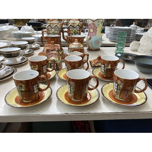 496 - Approx. twenty two pieces of Price Kensington Cottage ware together with a Price Kensington hand pai... 