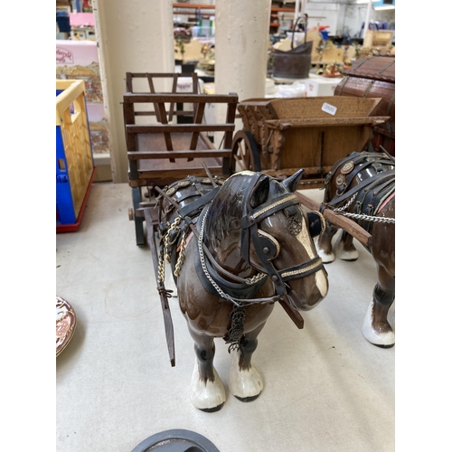 505 - Three ceramic shire horses with wooden carts together with one handmade Romany Rose gypsy caravan