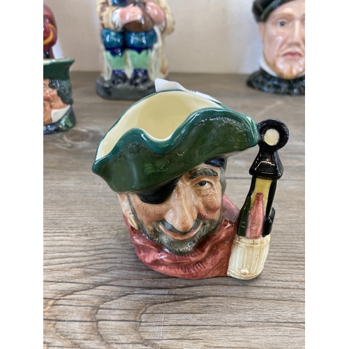 508 - A collection of ceramic character and toby jugs to include Royal Doulton Falstaff, Royal Doulton lim... 