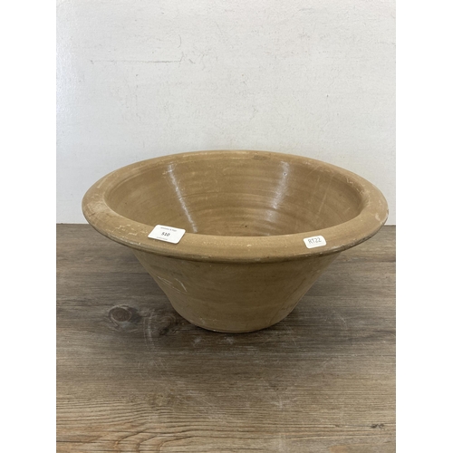 510 - A 19th century pottery dairy bowl - approx. 20cm high x 44cm diameter