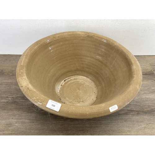 510 - A 19th century pottery dairy bowl - approx. 20cm high x 44cm diameter