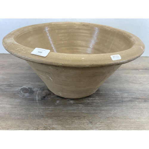 510 - A 19th century pottery dairy bowl - approx. 20cm high x 44cm diameter