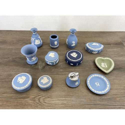 514 - Twelve pieces of Wedgwood Jasperware to include pale blue table lighter, three pale blue trinket box... 