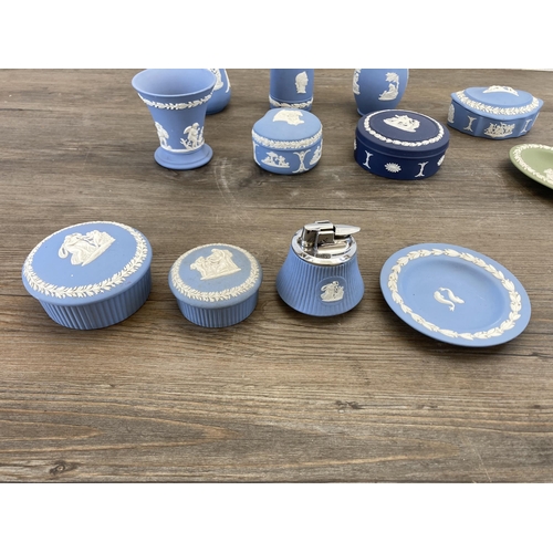 514 - Twelve pieces of Wedgwood Jasperware to include pale blue table lighter, three pale blue trinket box... 