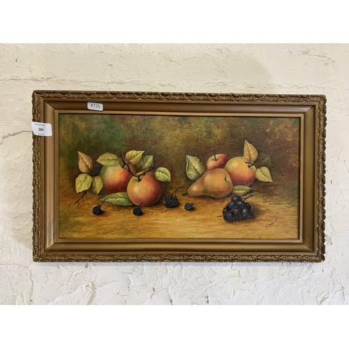 289 - A mid 20th century gilt framed oil on board still life of fruit by Coalport artist Joseph Mottram, s... 