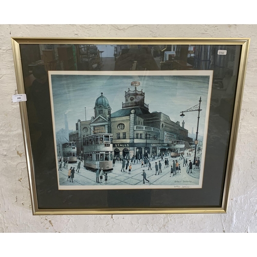 295 - A 20th century framed Arthur Delany pencil signed print of a Manchester street scene with blind mark... 