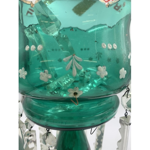 450A - A Victorian green glass table lustre - approx. 35cm high