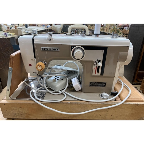 928 - A cased Janome New Home model 674 electric sewing machine with foot pedal and accessories