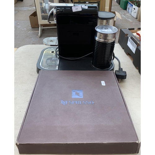 934 - A Magimix Nespresso 1130-M190 coffee machine with boxed empty pod container