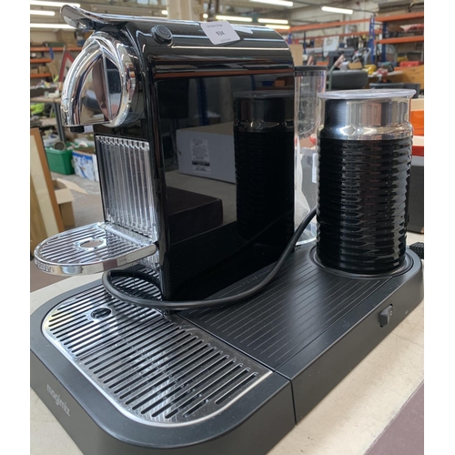 934 - A Magimix Nespresso 1130-M190 coffee machine with boxed empty pod container