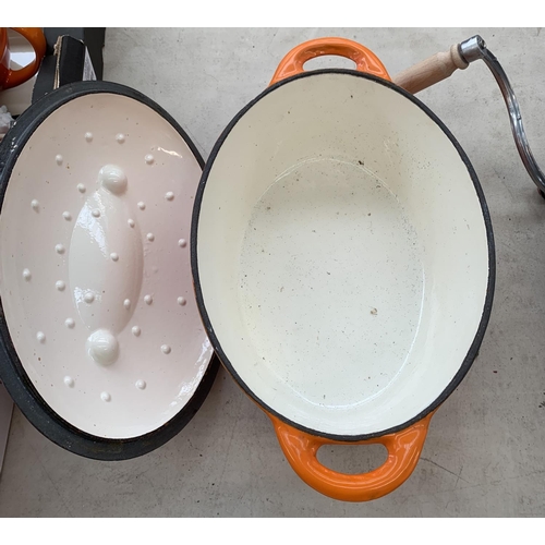 937 - Three items, one sausage stuffer, one enamelled cast iron oval lidded casserole and one mortar and p... 