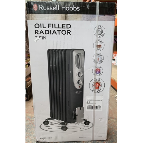 940 - A boxed Russell Hobbs seven-fin oil-filled radiator