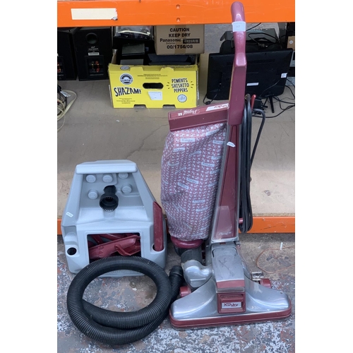 947 - A Kirby Legend II upright vacuum cleaner with attachments