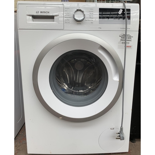 958 - A Bosch Series 4 8kg EcoSilence Drive 60cm washing machine with instruction manual