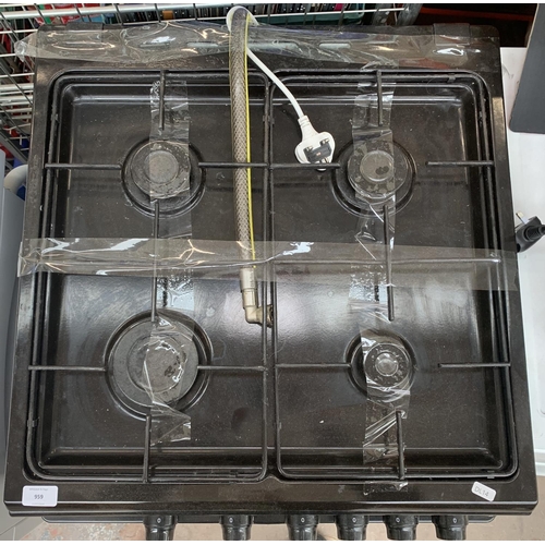 959 - A Logik two oven, four burner hob 60cm freestanding gas cooker