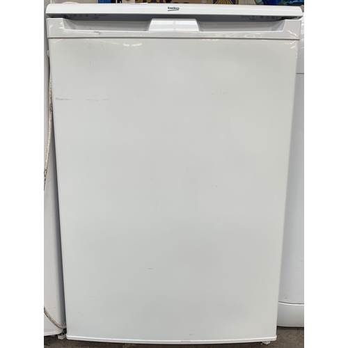 969 - A Beko 55cm under counter freezer