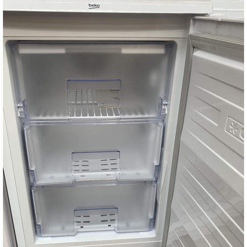 969 - A Beko 55cm under counter freezer