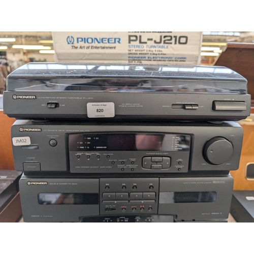 820 - A Pioneer stereo system comprising PL-J210 two-speed turntable with box, XD-J110 amplifier/CD player... 