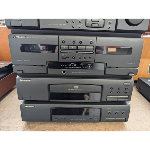 820 - A Pioneer stereo system comprising PL-J210 two-speed turntable with box, XD-J110 amplifier/CD player... 