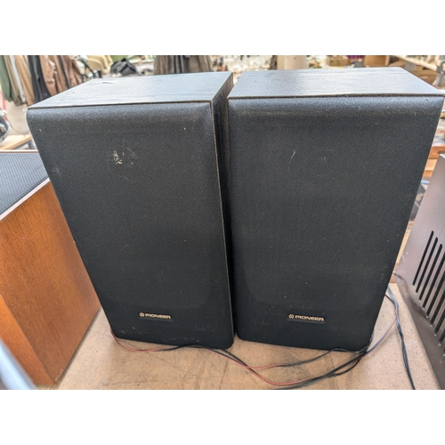 820 - A Pioneer stereo system comprising PL-J210 two-speed turntable with box, XD-J110 amplifier/CD player... 