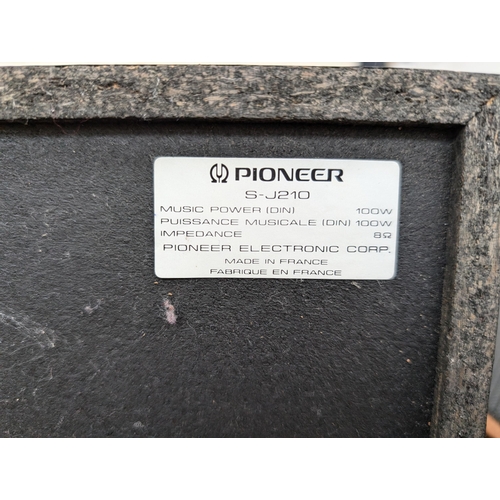 820 - A Pioneer stereo system comprising PL-J210 two-speed turntable with box, XD-J110 amplifier/CD player... 