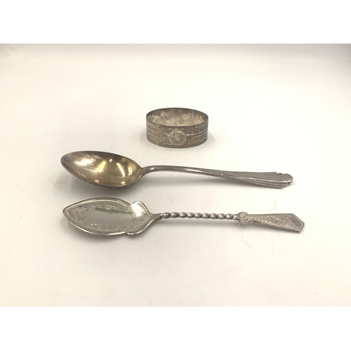 2134 - Three pieces of hallmarked silver, one Birmingham napkin ring, one Victorian William Aitken Chester ... 