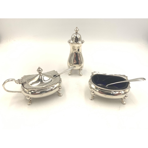 2136 - An Adie Brothers Ltd hallmarked Birmingham silver five piece condiment set comprising one mustard po... 