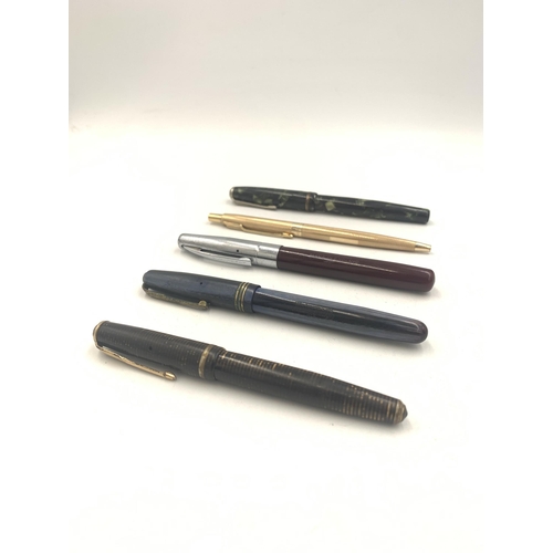 2141 - Five vintage writing instruments, one Parker fountain pen, one Parker ballpoint pen, one Wyvern No.8... 