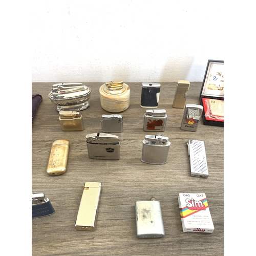 2144 - A collection of vintage table and cigarette lighters to include Cosmic, Ronson, Rowenta etc.