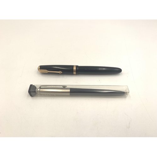 2144A - Seven writing instruments to include Parker Duofold fountain pen with 14ct gold nib, boxed Cross bal... 