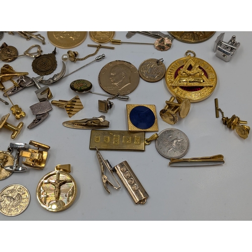 2145 - A collection of various military cufflinks, necklace pendants, coins and tie clips