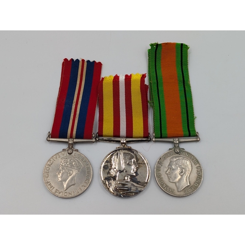 2146 - Three WWII British medals, one Defence presented to R. Litherland, one War and one Voluntary Medical... 