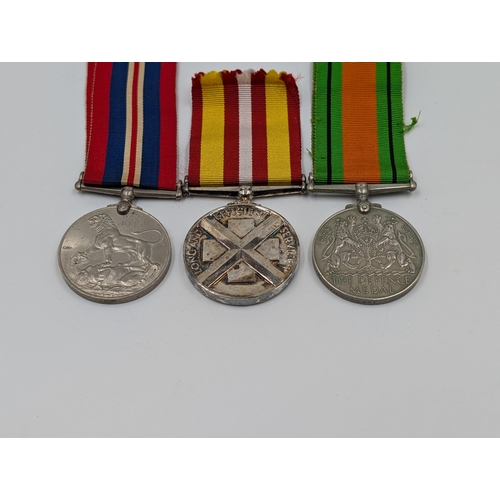 2146 - Three WWII British medals, one Defence presented to R. Litherland, one War and one Voluntary Medical... 