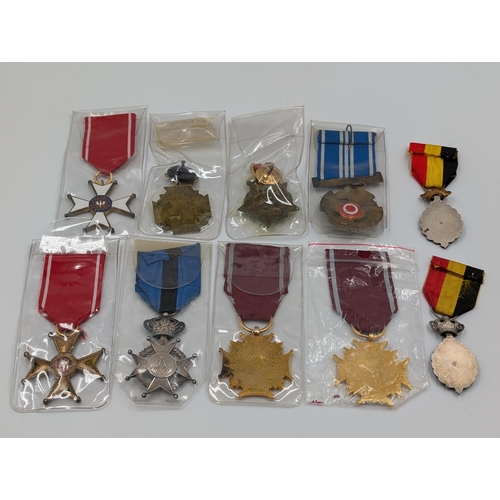 2147 - Ten military medals to include Belgian Order of Leopold II Knights Cross, Ukrainian Police Troops, P... 