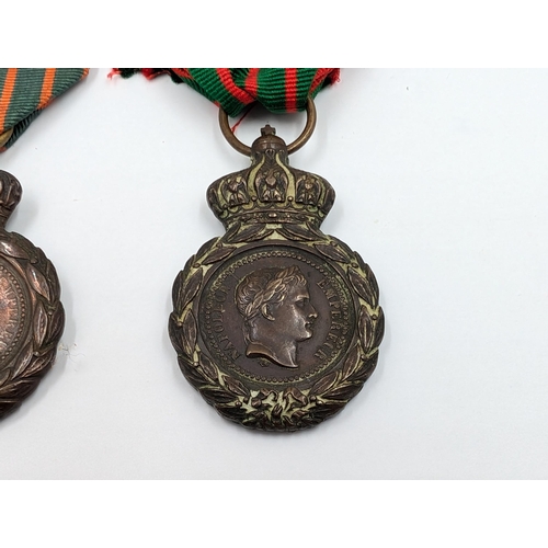 2151 - A pair of French Napoleon III 1857 - 1870 Saint Helena military medals