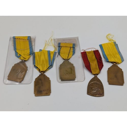 2152 - Five Belgian military medals, four WWII Service and one WWI Commemorative