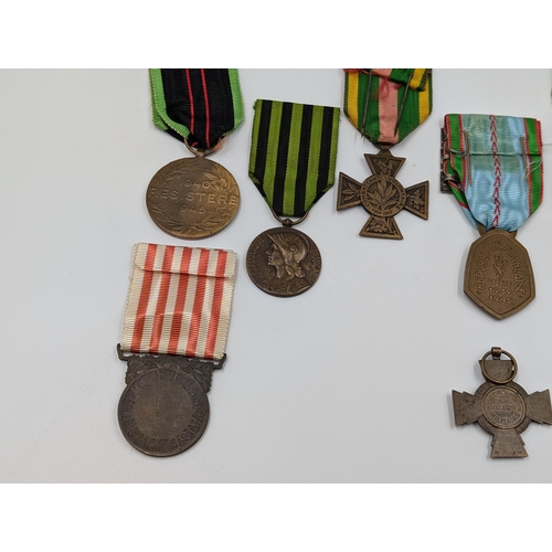 2154 - Ten French and Belgian WWI and WWII military medals to include Croix de Valeur, Combattant Volontair... 