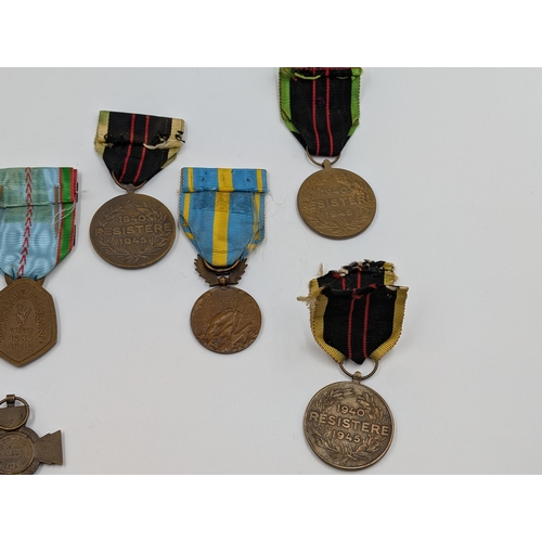 2154 - Ten French and Belgian WWI and WWII military medals to include Croix de Valeur, Combattant Volontair... 