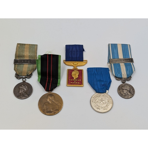 2158 - Five military medals to include Belgian Resistance, French Medaille Coloniale etc.