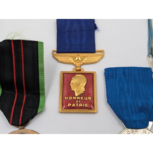 2158 - Five military medals to include Belgian Resistance, French Medaille Coloniale etc.