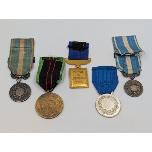 2158 - Five military medals to include Belgian Resistance, French Medaille Coloniale etc.