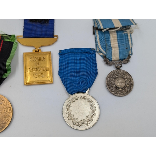 2158 - Five military medals to include Belgian Resistance, French Medaille Coloniale etc.