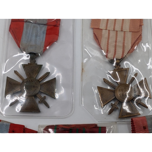 2159 - Five WWII Croix de Guerre military medals, four French and one Belgian