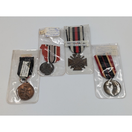 2160 - Four German military medals, one WWII Nazi War Merit, one WWI Hindenburg Cross, one WWI Imperial Ger... 