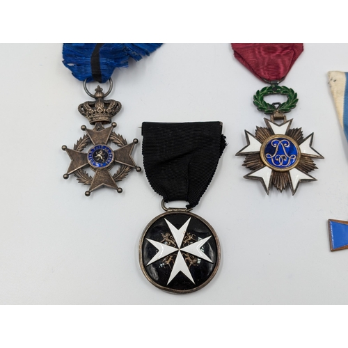 2161 - Five military medals, one Finnish Civil Guard Cross, one Order of Saint John, one Belgian Order of L... 