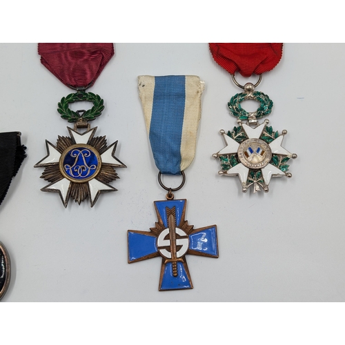 2161 - Five military medals, one Finnish Civil Guard Cross, one Order of Saint John, one Belgian Order of L... 