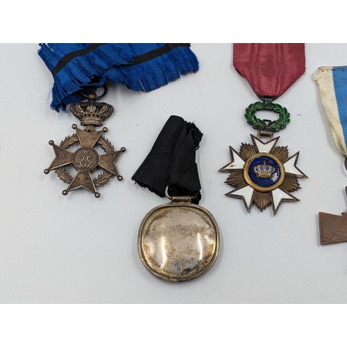 2161 - Five military medals, one Finnish Civil Guard Cross, one Order of Saint John, one Belgian Order of L... 