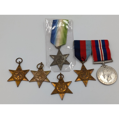 2163 - Six WWII British military medals, four The Star and one The Star and War pair